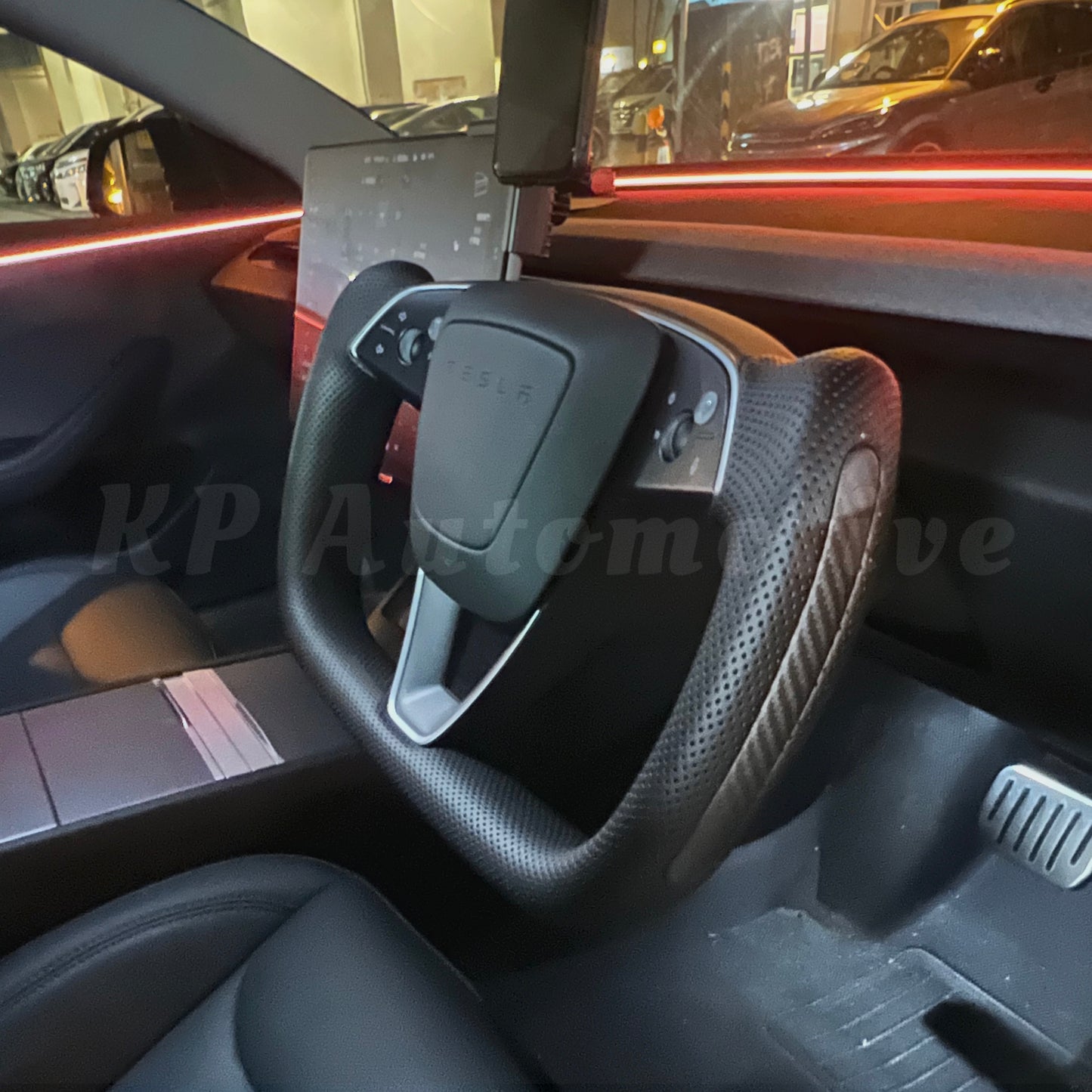 Model 3 Highland Yoke Wheel with Side Carbon Trim (Perforated Leather)